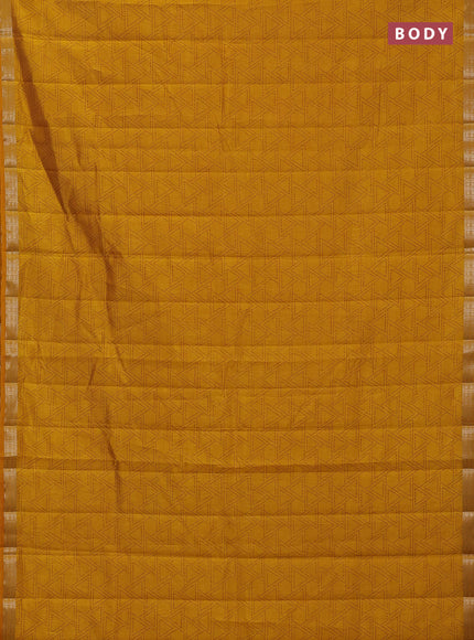 Semi raw silk saree dark mustard with allover geometric prints and zari woven border