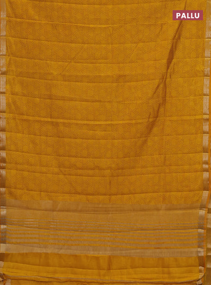 Semi raw silk saree dark mustard with allover geometric prints and zari woven border