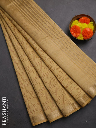 Semi raw silk saree sandal with allover geometric prints and zari woven border