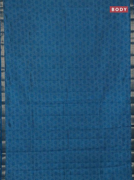 Semi raw silk saree teal blue with allover geometric prints and zari woven border