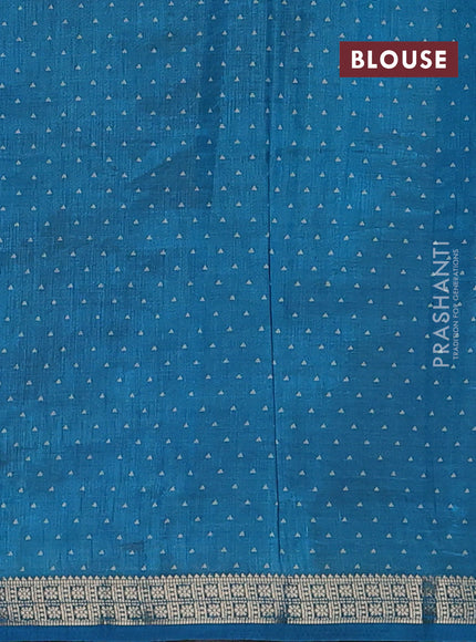 Semi raw silk saree teal blue with allover geometric prints and zari woven border