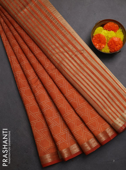 Semi raw silk saree rustic orange with allover geometric prints and zari woven border