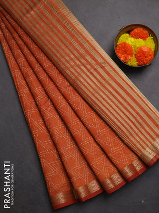 Semi raw silk saree rustic orange with allover geometric prints and zari woven border