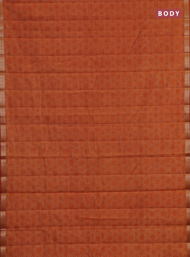 Semi raw silk saree rustic orange with allover geometric prints and zari woven border