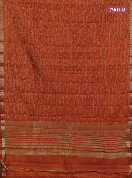 Semi raw silk saree rustic orange with allover geometric prints and zari woven border