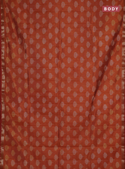 Semi raw silk saree rustic orange with allover butta prints and small zari woven border