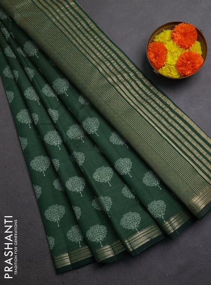Semi raw silk saree bottle green with allover butta prints and small zari woven border