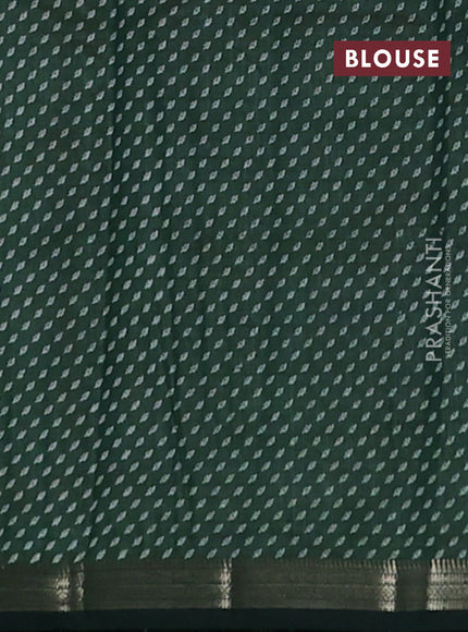 Semi raw silk saree bottle green with allover butta prints and small zari woven border
