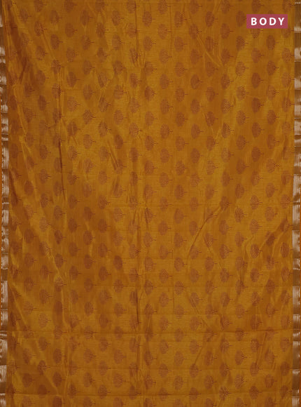 Semi raw silk saree dark mustard with allover butta prints and small zari woven border