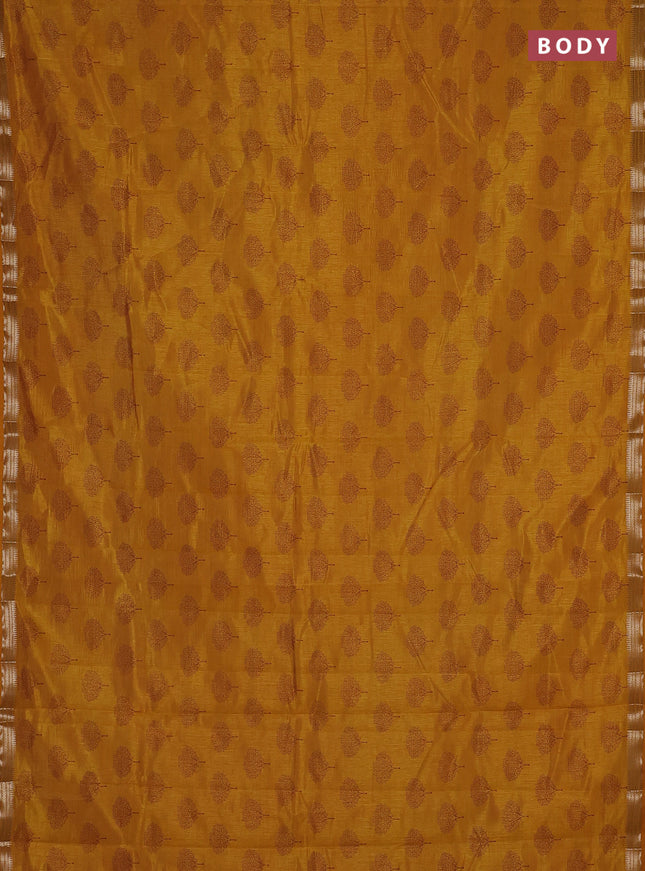 Semi raw silk saree dark mustard with allover butta prints and small zari woven border