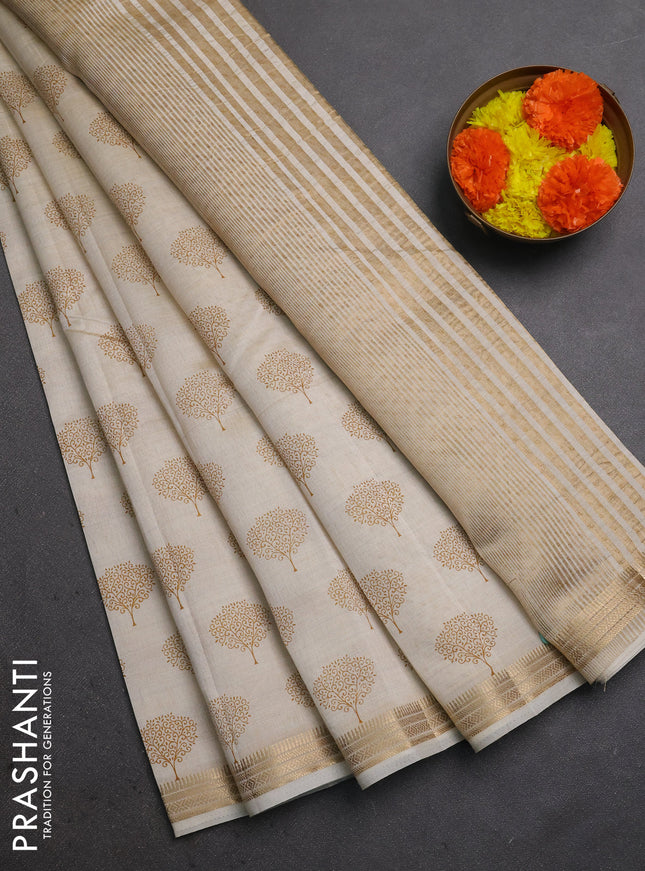 Semi raw silk saree cream with allover butta prints and small zari woven border