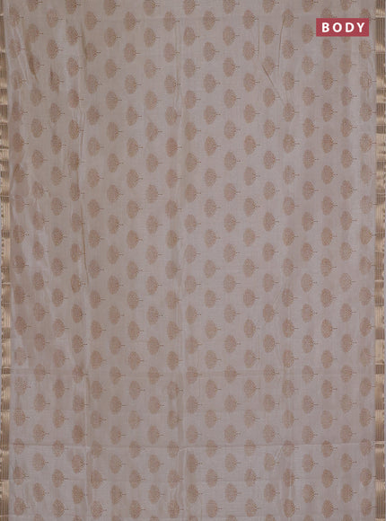 Semi raw silk saree cream with allover butta prints and small zari woven border