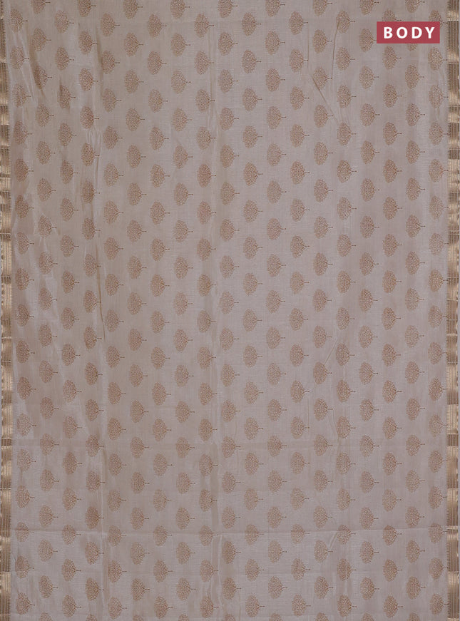 Semi raw silk saree cream with allover butta prints and small zari woven border