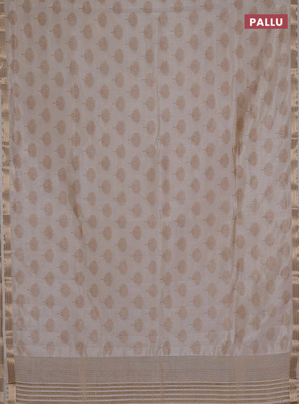 Semi raw silk saree cream with allover butta prints and small zari woven border