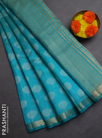 Semi raw silk saree teal blue with allover butta prints and small zari woven border
