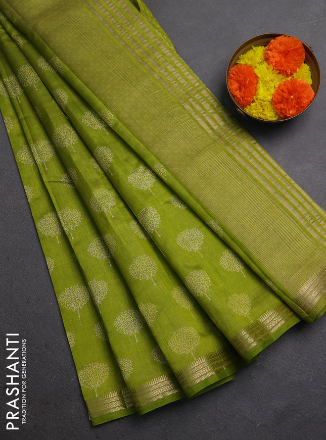 Semi raw silk saree light green with allover butta prints and small zari woven border