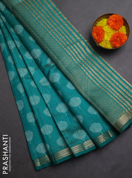 Semi raw silk saree teal green with allover butta prints and small zari woven border