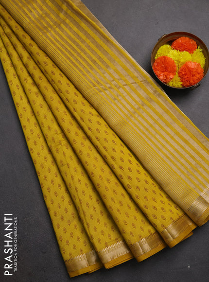 Semi raw silk saree mustard yellow with allover butta prints and zari woven border