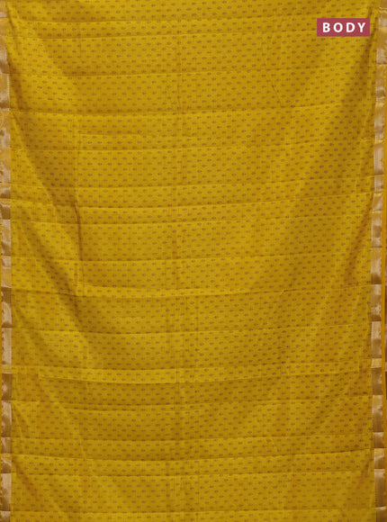 Semi raw silk saree mustard yellow with allover butta prints and zari woven border
