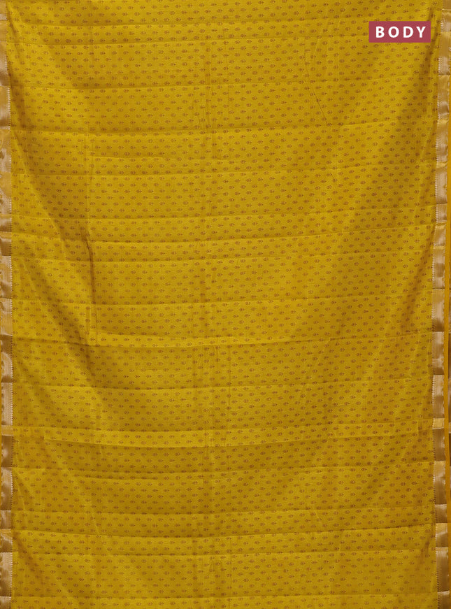 Semi raw silk saree mustard yellow with allover butta prints and zari woven border