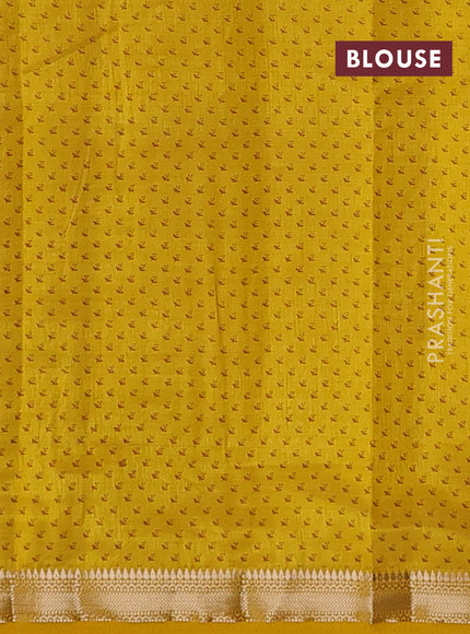 Semi raw silk saree mustard yellow with allover butta prints and zari woven border