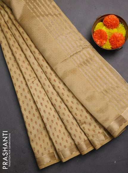 Semi raw silk saree sandal with allover butta prints and zari woven border