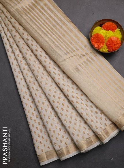 Semi raw silk saree cream with allover butta prints and zari woven border