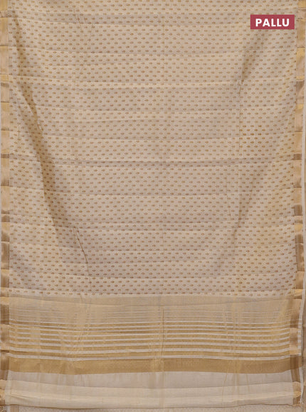 Semi raw silk saree cream with allover butta prints and zari woven border