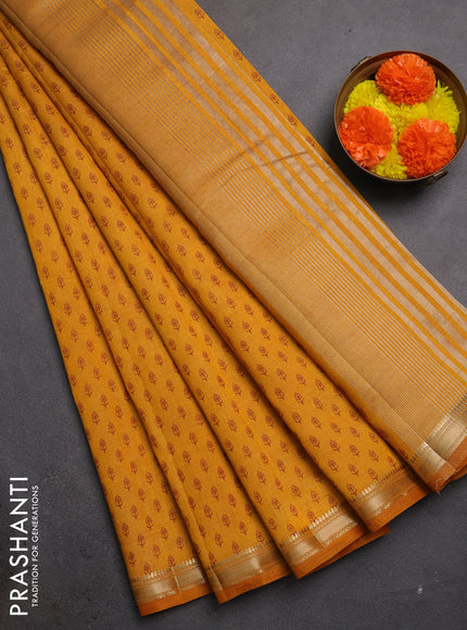 Semi raw silk saree dark mustard with allover butta prints and zari woven border