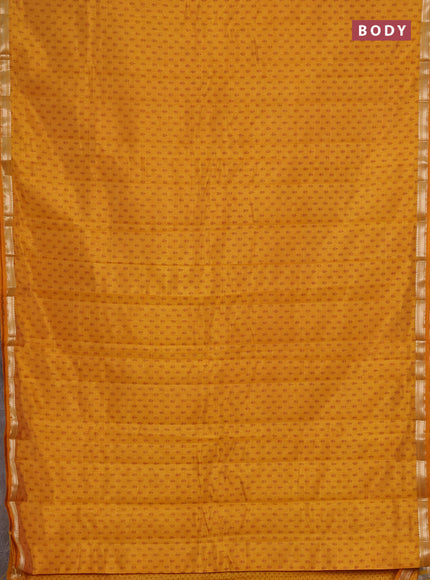 Semi raw silk saree dark mustard with allover butta prints and zari woven border