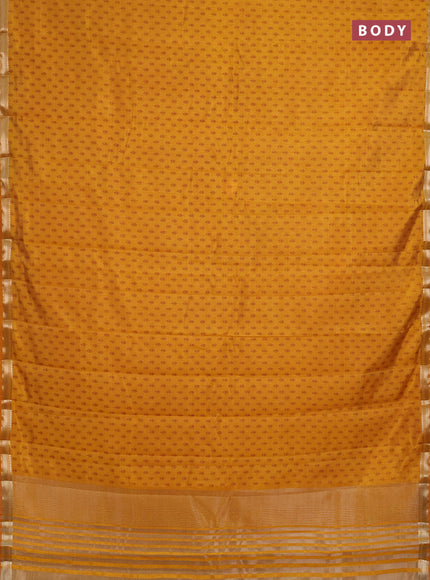 Semi raw silk saree dark mustard with allover butta prints and zari woven border