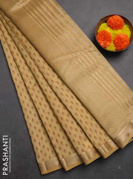 Semi raw silk saree dark sandal with allover butta prints and zari woven border
