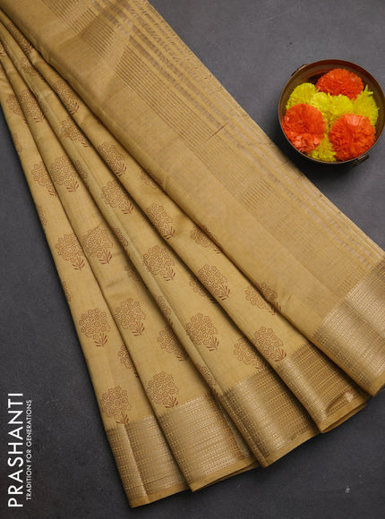 Semi raw silk saree sandal with allover floral butta prints and zari woven border