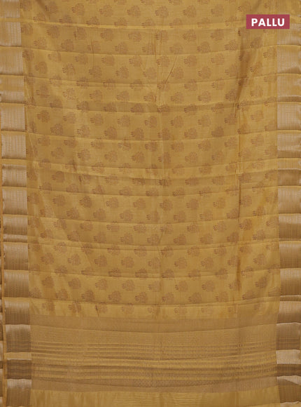 Semi raw silk saree sandal with allover floral butta prints and zari woven border