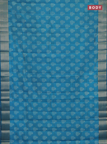 Semi raw silk saree teal blue with allover floral butta prints and zari woven border