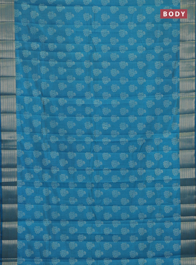 Semi raw silk saree teal blue with allover floral butta prints and zari woven border
