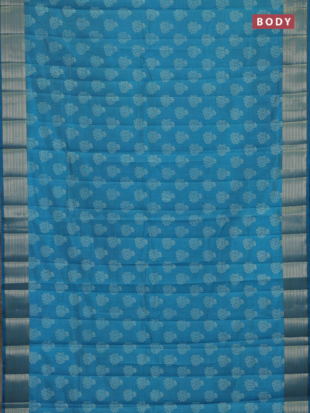Semi raw silk saree teal blue with allover floral butta prints and zari woven border