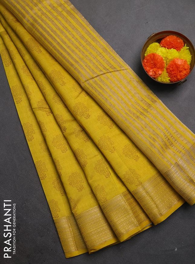 Semi raw silk saree mustard yellow with allover floral butta prints and zari woven border