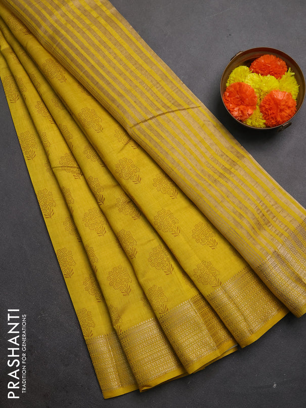 Semi raw silk saree mustard yellow with allover floral butta prints and zari woven border