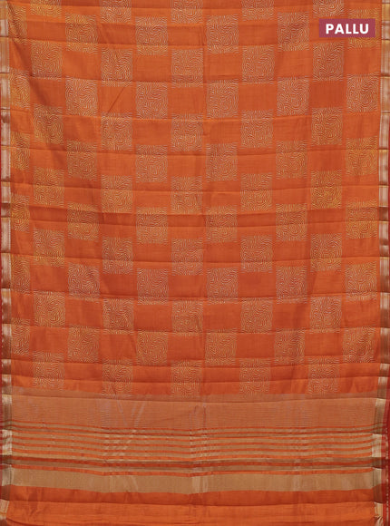 Semi raw silk saree rustic orange shade with allover box style butta prints and small zari woven border
