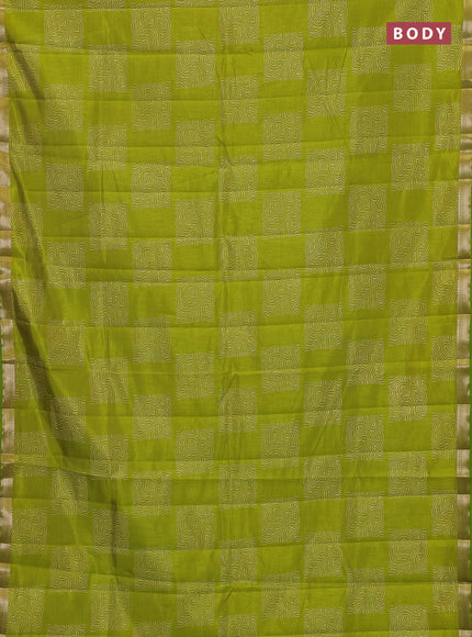 Semi raw silk saree light green with allover box style butta prints and small zari woven border