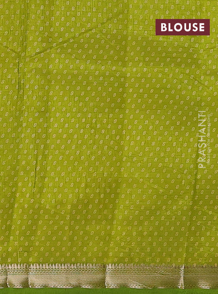 Semi raw silk saree light green with allover box style butta prints and small zari woven border
