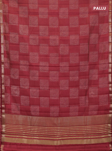 Semi raw silk saree maroon shade with allover box style butta prints and small zari woven border