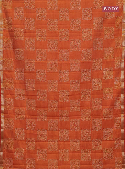 Semi raw silk saree rustic orange with allover box style butta prints and small zari woven border