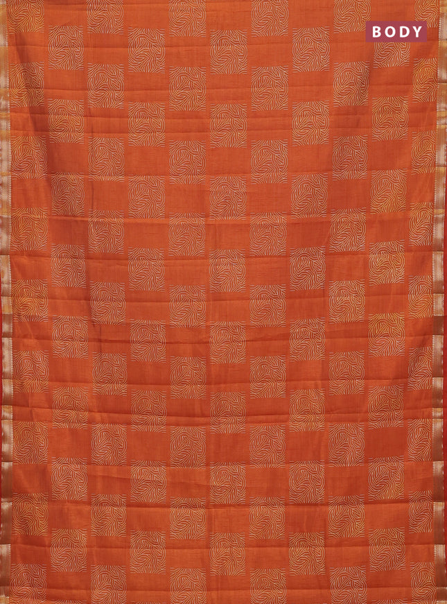 Semi raw silk saree rustic orange with allover box style butta prints and small zari woven border
