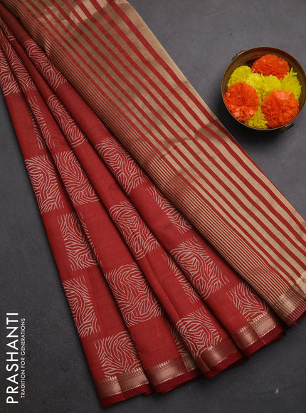 Semi raw silk saree rust with allover box style butta prints and small zari woven border