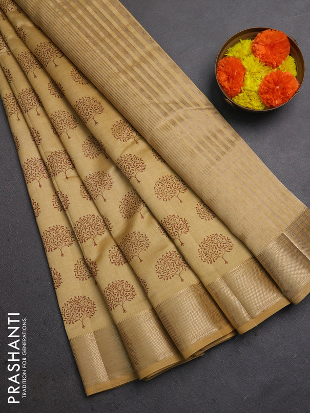 Semi raw silk saree sandal with allover butta prints and zari woven border
