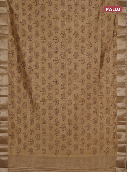 Semi raw silk saree sandal with allover butta prints and zari woven border