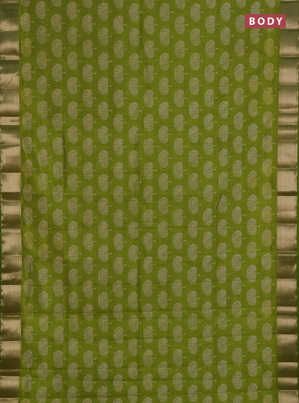 Semi raw silk saree light green with allover butta prints and zari woven border