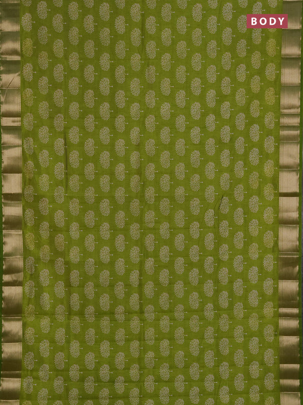 Semi raw silk saree light green with allover butta prints and zari woven border